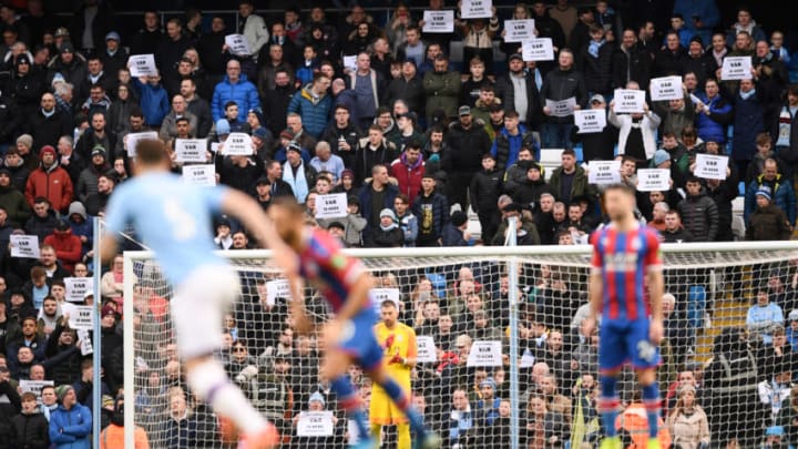 MANCHESTER, ENGLAND - JANUARY 18: Fans hold signs protesting against VAR during the Premier League match between Manchester City and Crystal Palace at Etihad Stadium on January 18, 2020 in Manchester, United Kingdom. (Photo by Laurence Griffiths/Getty Images)