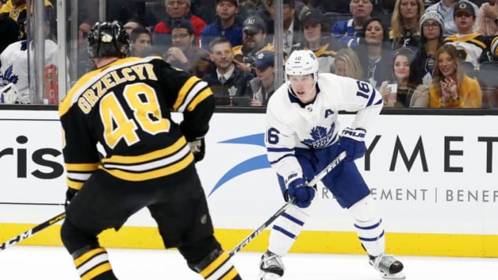 BOSTON, MA - OCTOBER 22: Toronto Maple Leafs right wing Mitchell Marner (16) checks on Boston Bruins left defenseman Matt Grzelcyk (48) during a game between the Boston Bruins and the Toronto Maple Leafs on October 22, 2019, at TD Garden in Boston, Massachusetts. (Photo by Fred Kfoury III/Icon Sportswire via Getty Images)
