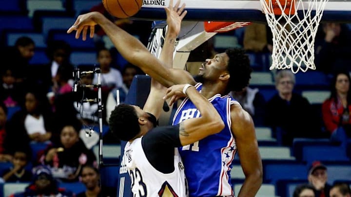 Dec 8, 2016; New Orleans, LA, USA; Philadelphia 76ers center Joel Embiid (21) blocks a shot by New Orleans Pelicans forward Anthony Davis (23) during the first quarter of a game at the Smoothie King Center. Mandatory Credit: Derick E. Hingle-USA TODAY Sports