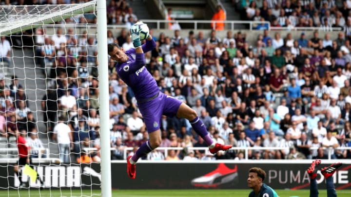 NEWCASTLE UPON TYNE, ENGLAND - AUGUST 11: Martin Dubravka of Newcastle United saves a shot from Dele Alli of Tottenham Hotspur during the Premier League match between Newcastle United and Tottenham Hotspur at St. James Park on August 11, 2018 in Newcastle upon Tyne, United Kingdom. (Photo by Jan Kruger/Getty Images)
