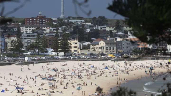 SYDNEY, AUSTRALIA - JANUARY 14: A general view of a busy Bondi Beach on January 14, 2021 in Sydney, Australia. New South Wales recorded no new locally acquired cases of COVID-19 in the last 24 hour reporting period. The last time there were no locally acquired cases in NSW was on 6 January 2021. (Photo by Brook Mitchell/Getty Images)