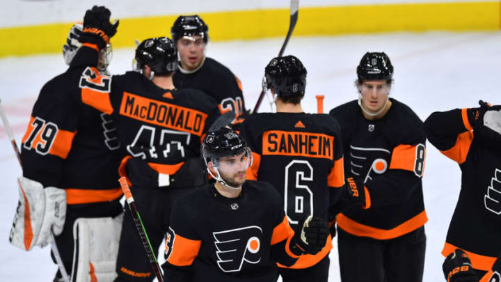 PHILADELPHIA, PA - FEBRUARY 09: Philadelphia Flyers defenseman Shayne Gostisbehere (53) and the Philadelphia Flyers celibate their victory during the NHL hockey game between the Anaheim Ducks and the Philadelphia Flyers on February 09, 2019 at the Wells Fargo Center in Philadlephia PA. (Photo by Gavin Baker/Icon Sportswire via Getty Images)