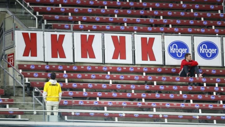 CINCINNATI, OH - APRIL 23: General view as a single fan and security guard sit in an empty section of seats where strike outs are displayed during a game between the Atlanta Braves and Cincinnati Reds at Great American Ball Park on April 23, 2018 in Cincinnati, Ohio. The Reds won 10-4. (Photo by Joe Robbins/Getty Images) *** Local Caption ***