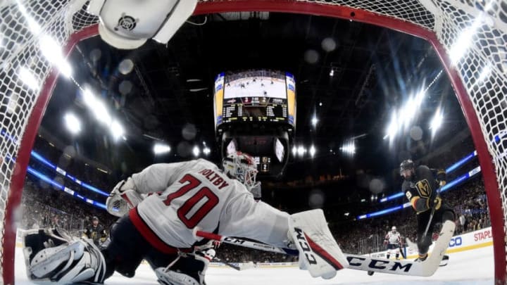 LAS VEGAS, NV - MAY 30: Braden Holtby #70 of the Washington Capitals makes a diving stick-save on Alex Tuch #89 of the Vegas Golden Knights during the third period in Game Two of the 2018 NHL Stanley Cup Final at T-Mobile Arena on May 30, 2018 in Las Vegas, Nevada. The Capitals defeated the Golden Knights3-2. (Photo by Jeff Bottari/NHLI via Getty Images)