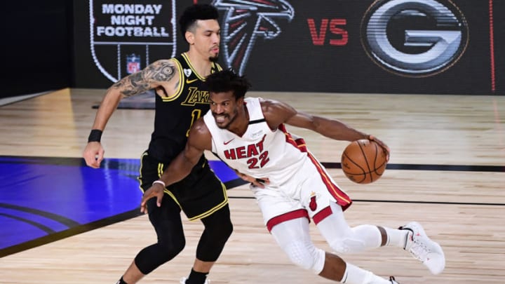 LAKE BUENA VISTA, FLORIDA - OCTOBER 02: Jimmy Butler #22 of the Miami Heat dribbles against Danny Green #14 of the Los Angeles Lakers during the second half in Game Two of the 2020 NBA Finals at AdventHealth Arena at ESPN Wide World Of Sports Complex on October 02, 2020 in Lake Buena Vista, Florida. NOTE TO USER: User expressly acknowledges and agrees that, by downloading and or using this photograph, User is consenting to the terms and conditions of the Getty Images License Agreement. (Photo by Douglas P. DeFelice/Getty Images)