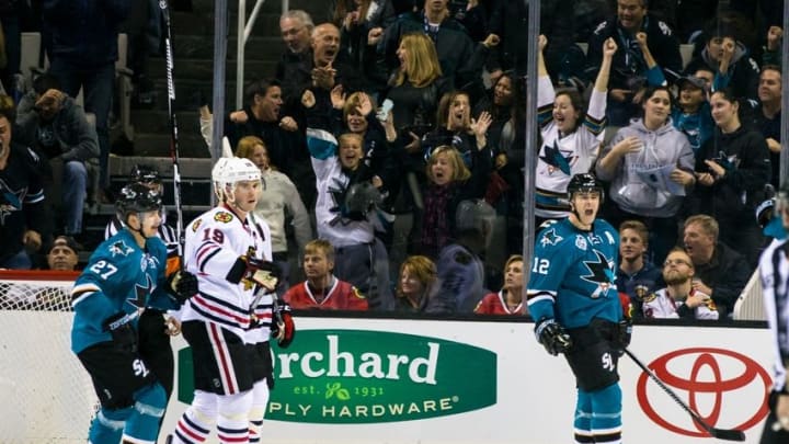 Nov 25, 2015; San Jose, CA, USA; San Jose Sharks center Patrick Marleau (12) celebrates after scoring against the Chicago Blackhawks in the 3rd period at SAP Center at San Jose. Mandatory Credit: John Hefti-USA TODAY Sports. The Blackhawks won 5-2.