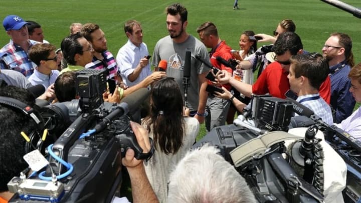 Jun 7, 2016; Englewood, CO, USA; Denver Broncos quarterback Paxton Lynch (12) talks to the media following mini camp drills at the UCHealth Training Center. Mandatory Credit: Ron Chenoy-USA TODAY Sports