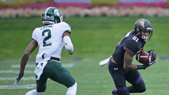 EVANSTON, IL – OCTOBER 28: Ramaud Chiaokhiao-Bowman #81 of the Northwestern Wildcats runs after a catch as Justin Layne #2 of the Michigan State Spartans closes in at Ryan Field on October 28, 2017 in Evanston, Illinois. Northwestern defeated Michigan State 39-31 in triple overtime. (Photo by Jonathan Daniel/Getty Images)