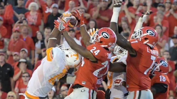 Oct 1, 2016; Athens, GA, USA; Tennessee Volunteers wide receiver Jauan Jennings (15) catches a game winning touchdown pass in front of Georgia Bulldogs safety Dominick Sanders (24) on the last play on the game during the fourth quarter at Sanford Stadium. Tennessee defeated Georgia 34-31. Mandatory Credit: Dale Zanine-USA TODAY Sports