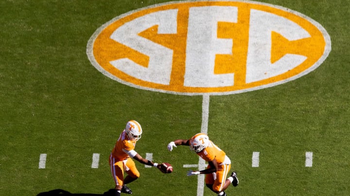 Tennessee quarterback Jarrett Guarantano (2) hands the ball off to Tennessee running back Ty Chandler (8) during a SEC conference football game between the Tennessee Volunteers and the Kentucky Wildcats held at Neyland Stadium in Knoxville, Tenn., on Saturday, October 17, 2020.Kns Ut Football Kentucky Bp