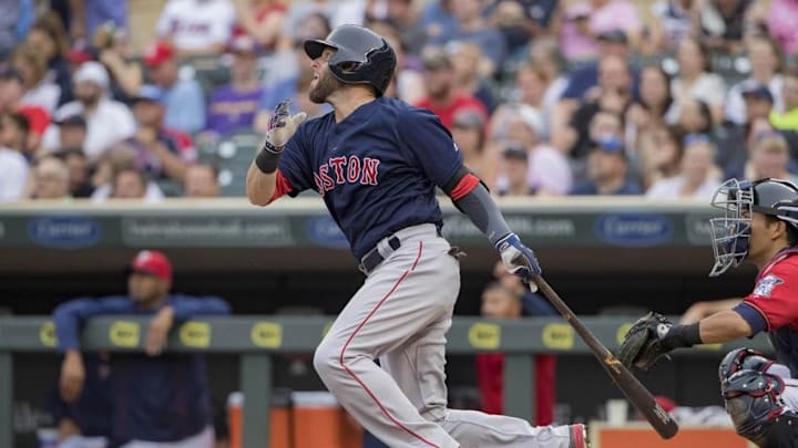 Jun 10, 2016; Minneapolis, MN, USA; Boston Red Sox second baseman Dustin Pedroia (15) hits a double in the first inning against the Minnesota Twins at Target Field. Mandatory Credit: Jesse Johnson-USA TODAY Sports