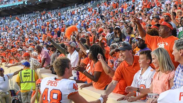 Clemson punter Will Spiers (48) meets family and friends following a 21-20 win over North Carolina after the game at Kenan Memorial Stadium in Chapel Hill, North Carolina Saturday, September 28, 2019.Clemson Unc 1st Half