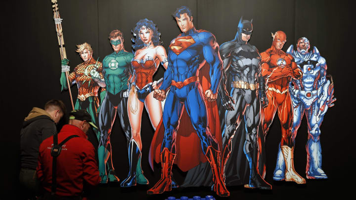 Batman, Superman, Wonder Woman, The Joker (Photo by Thierry Chesnot/Getty Images)