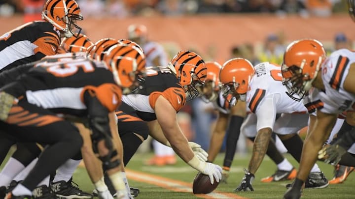 Nov 5, 2015; Cincinnati, OH, USA; General view of the line of scrimmage as Cincinnati Bengals center Russell Bodine (61) prepares to snap the ball to quarterback Andy Dalton (14) during an NFL football game against the Cleveland Browns at Paul Brown Stadium. Mandatory Credit: Kirby Lee-USA TODAY Sports