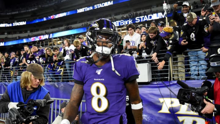 BALTIMORE, MARYLAND - JANUARY 11: Lamar Jackson #8 of the Baltimore Ravens walks on the field prior to playing against the Tennessee Titans in the AFC Divisional Playoff game at M&T Bank Stadium on January 11, 2020 in Baltimore, Maryland. (Photo by Will Newton/Getty Images)