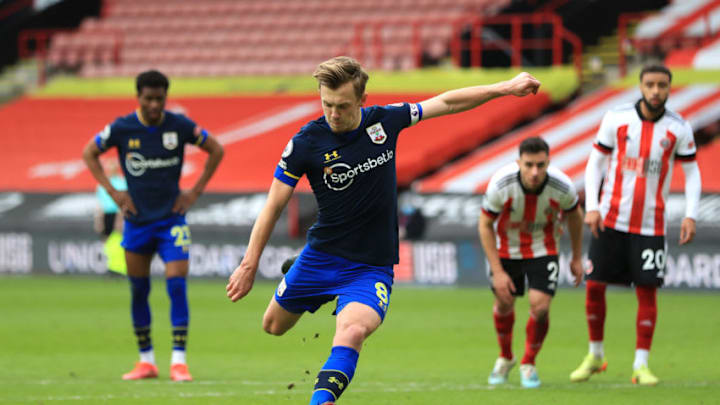 SHEFFIELD, ENGLAND - MARCH 06: James Ward-Prowse of Southampton scores their side's first goal from the penalty spot during the Premier League match between Sheffield United and Southampton at Bramall Lane on March 06, 2021 in Sheffield, England. Sporting stadiums around the UK remain under strict restrictions due to the Coronavirus Pandemic as Government social distancing laws prohibit fans inside venues resulting in games being played behind closed doors. (Photo by Mike Egerton - Pool/Getty Images)