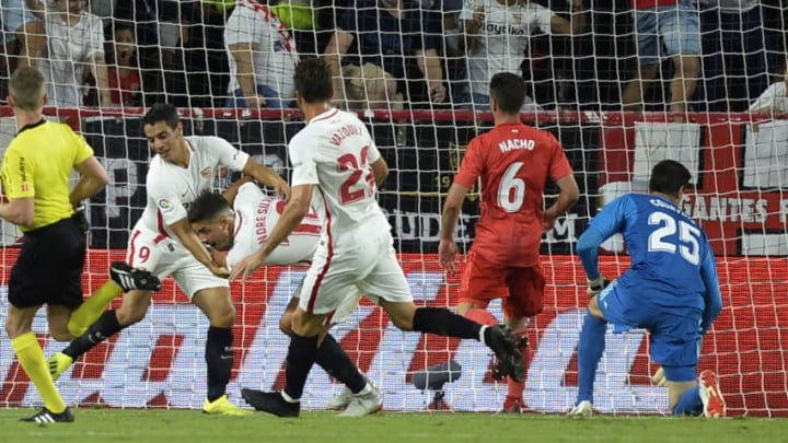 Sevilla's Portuguese forward Andre Silva (4R) celebrates after scoring a goal during the Spanish league football match Sevilla FC against Real Madrid CF at the Ramon Sanchez Pizjuan stadium in Seville on September 26, 2018. (Photo by CRISTINA QUICLER / AFP) (Photo credit should read CRISTINA QUICLER/AFP/Getty Images)