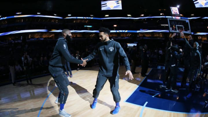 MEMPHIS, TN - JANUARY 17: Kyle O'Quinn #9 and Courtney Lee #5 of the New York Knicks get introduced before the game against the Memphis Grizzlies on January 17, 2018 at FedExForum in Memphis, Tennessee. NOTE TO USER: User expressly acknowledges and agrees that, by downloading and or using this photograph, User is consenting to the terms and conditions of the Getty Images License Agreement. Mandatory Copyright Notice: Copyright 2018 NBAE (Photo by Joe Murphy/NBAE via Getty Images)