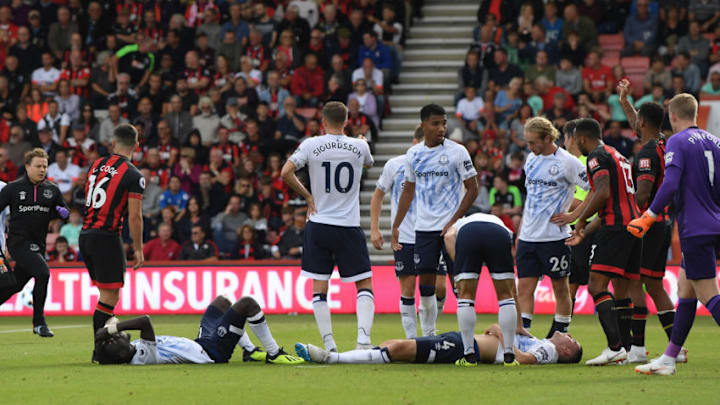 BOURNEMOUTH, ENGLAND - AUGUST 25: Idrissa Gueye and Michael Keane of Everton lie injured after a clash of heads during the Premier League match between AFC Bournemouth and Everton FC at Vitality Stadium on August 25, 2018 in Bournemouth, United Kingdom. (Photo by Mike Hewitt/Getty Images)