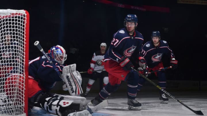 COLUMBUS, OH - JANUARY 15: Goaltender Joonas Korpisalo #70 of the Columbus Blue Jackets deflects a shot during the second period of a game against the New Jersey Devils on January 15, 2019 at Nationwide Arena in Columbus, Ohio. (Photo by Jamie Sabau/NHLI via Getty Images)