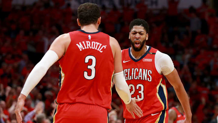 NEW ORLEANS, LA - APRIL 19: Anthony Davis #23 of the New Orleans Pelicans and Nikola Mirotic #3 of the New Orleans Pelicans react after scoring against the Portland Trail Blazers during Game 3 of the Western Conference playoffs at the Smoothie King Center on April 19, 2018 in New Orleans, Louisiana. NOTE TO USER: User expressly acknowledges and agrees that, by downloading and or using this photograph, User is consenting to the terms and conditions of the Getty Images License Agreement. (Photo by Sean Gardner/Getty Images)