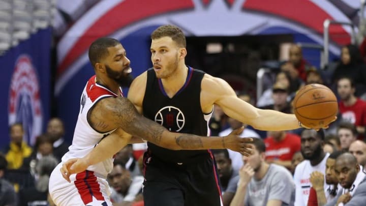 Dec 18, 2016; Washington, DC, USA; LA Clippers forward Blake Griffin (32) passes the ball as Washington Wizards forward Markieff Morris (5) defends in the fourth quarter at Verizon Center. The Wizards won 117-110. Mandatory Credit: Geoff Burke-USA TODAY Sports