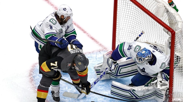 Thatcher Demko #35 of the Vancouver Canucks stops a shot against William Karlsson #71 of the Vegas Golden Knights