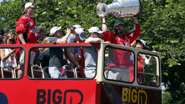 WASHINGTON, DC - JUNE 12: Alex Ovechkin of the NHL champions Washington Capitals holds up the Stanley Cup during a victory parade along Contitution Avenue June 12, 2018, in Washington, DC. (Photo by Alex Brandon-Pool/Getty Images)