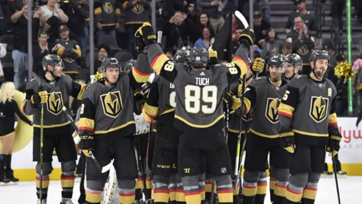 LAS VEGAS, NEVADA - NOVEMBER 17: The Vegas Golden Knights celebrate after defeating the Calgary Flames at T-Mobile Arena on November 17, 2019 in Las Vegas, Nevada. (Photo by Jeff Bottari/NHLI via Getty Images)