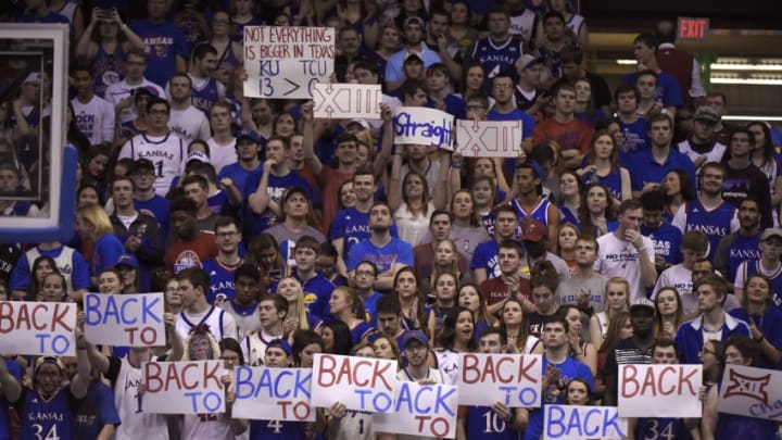 LAWRENCE, KS - FEBRUARY 22: Kansas Jayhawks fans hold up signs as Kansas prepares to win their 13th straight Big 12 Conference Championship during a game against the TCU Horned Frogs at Allen Fieldhouse on February 22, 2017 in Lawrence, Kansas. (Photo by Ed Zurga/Getty Images)