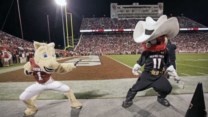 NORMAN, OK - OCTOBER 22: The Oklahoma Sooners mascot Boomer faces off with Texas Tech's mascot Masked Rider October 22, 2011 at Gaylord Family-Oklahoma Memorial Stadium in Norman, Oklahoma. Texas Tech upset Oklahoma 41-38. (Photo by Brett Deering/Getty Images)