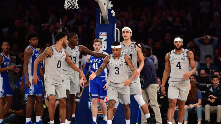 NEW YORK, NEW YORK – NOVEMBER 22: The Georgetown Hoyas high five James Akinjo #3 after a foul call during the second half of their game against the Duke Blue Devils at Madison Square Garden on November 22, 2019 in New York City. (Photo by Emilee Chinn/Getty Images)