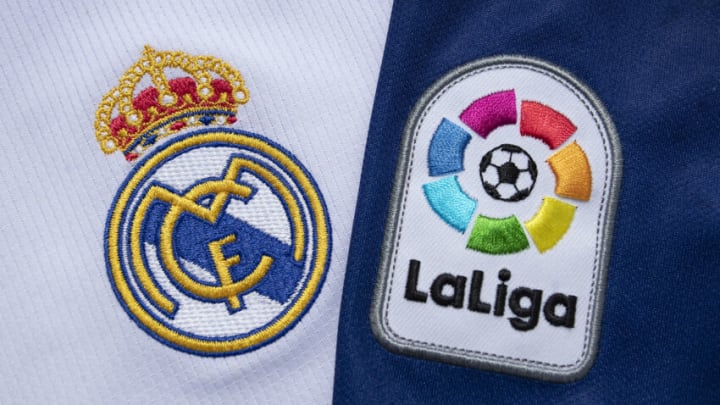 MANCHESTER, ENGLAND - JULY 22: The FC Barcelona and Real Madrid club crests on the first team home shirts witht the La Liga logo on July 22, 2020 in Manchester, United Kingdom. (Photo by Visionhaus)