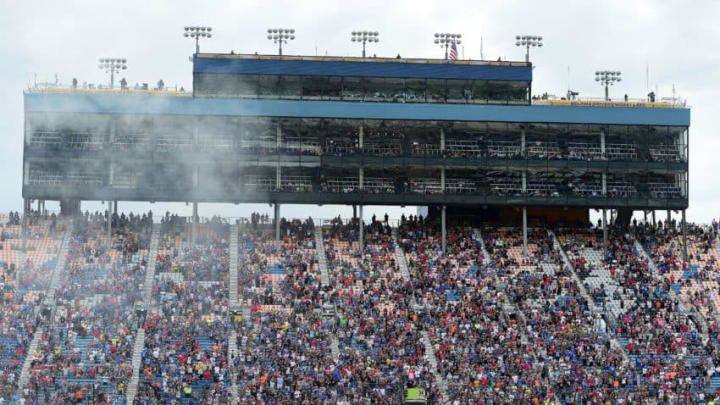 JOLIET, IL - SEPTEMBER 17: Martin Truex Jr., driver of the #78 Furniture Row/Denver Mattress Toyota, celebrates with a burnout after winning during the Monster Energy NASCAR Cup Series Tales of the Turtles 400 at Chicagoland Speedway on September 17, 2017 in Joliet, Illinois. (Photo by Jared C. Tilton/Getty Images)