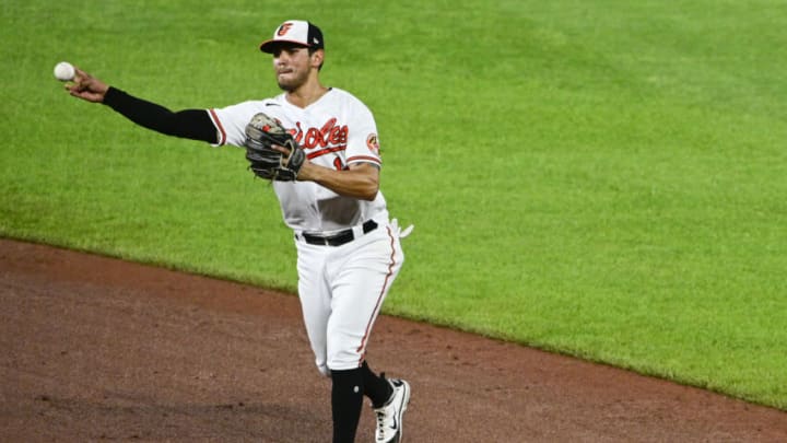 Apr 28, 2021; Baltimore, Maryland, USA; Baltimore Orioles third baseman Rio Ruiz (14)throws to first base against the New York Yankees at Oriole Park at Camden Yards. Mandatory Credit: Tommy Gilligan-USA TODAY Sports