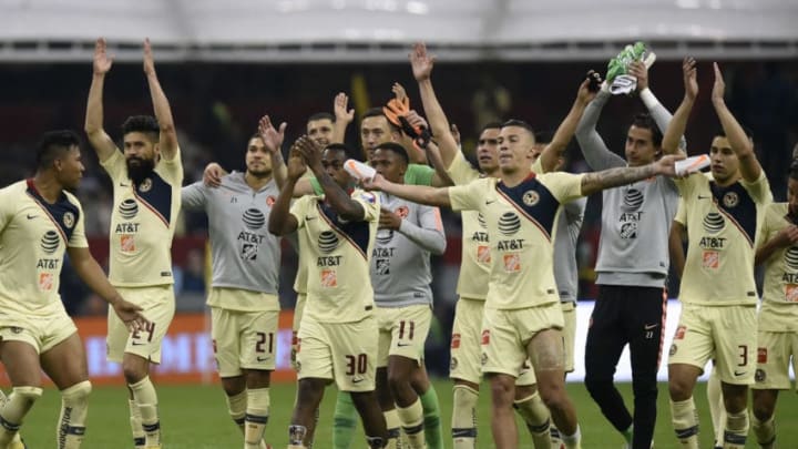 America players celebrate their victory over Pumas during the second round of semifinals of the Mexican Apertura tournament football match at the Azteca stadium on December 9, 2018, in Mexico City. (Photo by ALFREDO ESTRELLA / AFP) (Photo credit should read ALFREDO ESTRELLA/AFP/Getty Images)