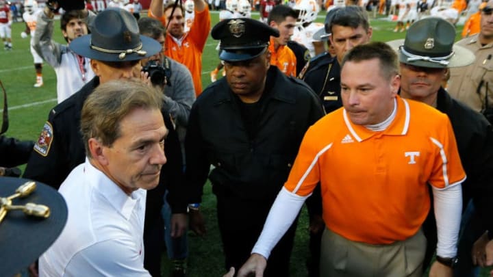 TUSCALOOSA, AL - OCTOBER 26: Head coach Nick Saban of the Alabama Crimson Tide shakes hands with head coach Butch Jones of the Tennessee Volunteers at Bryant-Denny Stadium on October 26, 2013 in Tuscaloosa, Alabama. (Photo by Kevin C. Cox/Getty Images)