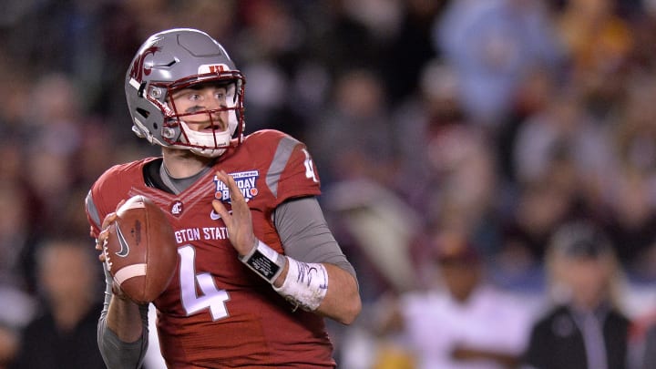 Dec 27, 2016; San Diego , CA, USA; Washington State Cougars quarterback Luke Falk (4) looks to pass against the Minnesota Golden Gophers during the second quarter at Qualcomm Stadium. Mandatory Credit: Jake Roth-USA TODAY Sports