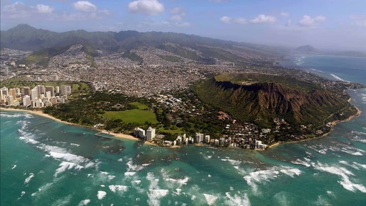 Jan 22, 2014; Honolulu, HI, USA; Aerial view of the Diamond Head crater and Waikiki Beach and Honolulu skyline in advance of the Pro Bowl. Mandatory Credit: Kirby Lee-USA TODAY Sports
