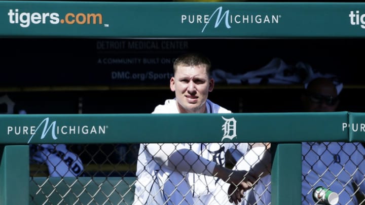 DETROIT, MI - JUNE 27: JaCoby Jones #21 of the Detroit Tigers watches from the dugout during the ninth inning of a 3-1 loss to the Texas Rangers at Comerica Park on June 27, 2019 in Detroit, Michigan. The Rangers defeated the Tigers 3-1. (Photo by Duane Burleson/Getty Images)