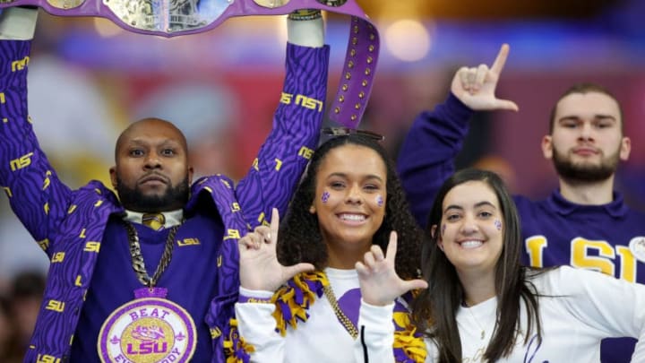 ATLANTA, GEORGIA - DECEMBER 28: LSU Tigers fans cheer for their team before the game against the Oklahoma Sooners in the Chick-fil-A Peach Bowl at Mercedes-Benz Stadium on December 28, 2019 in Atlanta, Georgia. (Photo by Todd Kirkland/Getty Images)