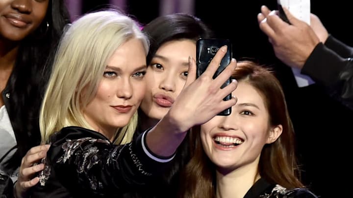 SHANGHAI, CHINA - NOVEMBER 18: Victoria's Secret models Karlie Kloss, Ming Xi and Sui He pose during the All Model Appearance At Mercedes-Benz Arena on November 18, 2017 in Shanghai, China. (Photo by Frazer Harrison/Getty Images for Victoria's Secret)