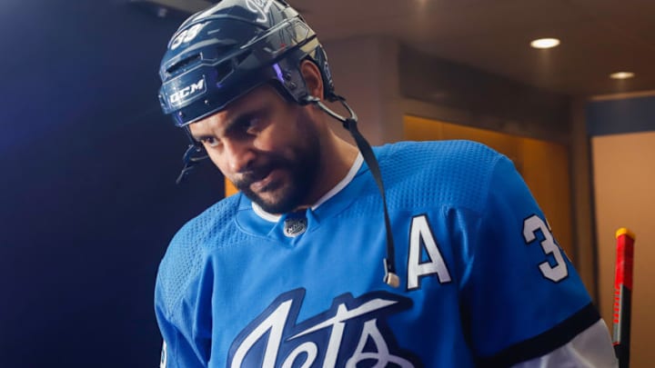 WINNIPEG, MB - DECEMBER 11: Dustin Byfuglien #33 of the Winnipeg Jets heads to the ice prior to puck drop against the Chicago Blackhawks at the Bell MTS Place on December 11, 2018 in Winnipeg, Manitoba, Canada. (Photo by Darcy Finley/NHLI via Getty Images)