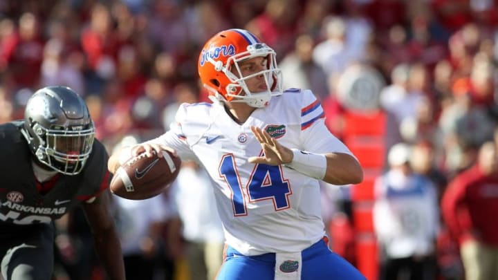 Nov 5, 2016; Fayetteville, AR, USA; Florida Gators quarterback Luke Del Rio (14) passes during the first quarter against the Arkansas Razorbacks at Donald W. Reynolds Razorback Stadium. Mandatory Credit: Nelson Chenault-USA TODAY Sports