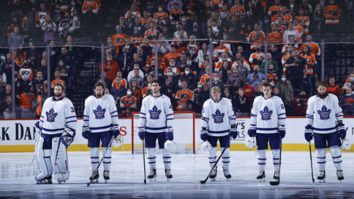PHILADELPHIA, PENNSYLVANIA - NOVEMBER 10: (L-R) Jack Campbell #36, Justin Holl #3, Pierre Engvall #47, Ondrej Kase #25, David Kampf #64 and Jake Muzzin #8 of the Toronto Maple Leafs look on before playing against the Philadelphia Flyers at Wells Fargo Center on November 10, 2021 in Philadelphia, Pennsylvania. (Photo by Tim Nwachukwu/Getty Images)
