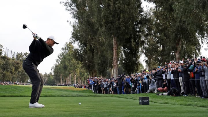PACIFIC PALISADES, CALIFORNIA - FEBRUARY 17: Tiger Woods of the United States plays his shot from the 11th tee during the second round of the The Genesis Invitational at Riviera Country Club on February 17, 2023 in Pacific Palisades, California. (Photo by Harry How/Getty Images)