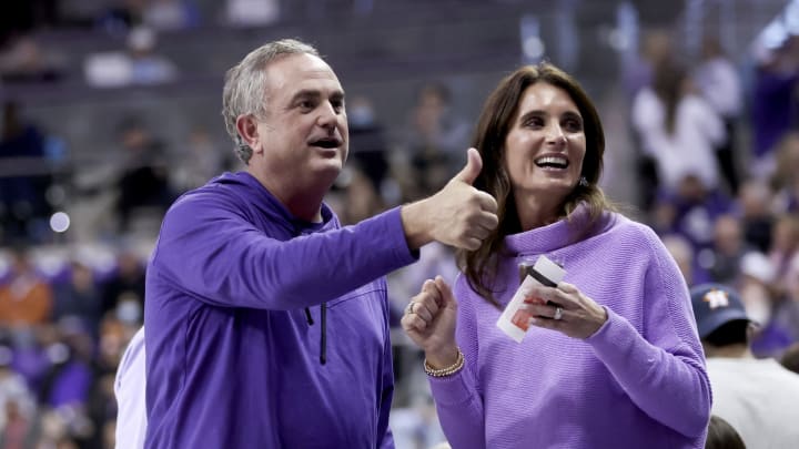 Jan 25, 2022; Fort Worth, Texas, USA; TCU Horned Frogs head football coach Sonny Dykes and wife Kate during the game against the Texas Longhorns at Ed and Rae Schollmaier Arena. Mandatory Credit: Kevin Jairaj-USA TODAY Sports