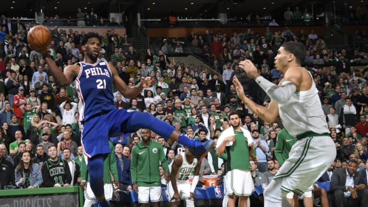 BOSTON, MA - JANUARY 18: Joel Embiid #21 of the Philadelphia 76ers passes the ball during the game against the Boston Celtics on January 18, 2018 at the TD Garden in Boston, Massachusetts. NOTE TO USER: User expressly acknowledges and agrees that, by downloading and/or using this photograph, user is consenting to the terms and conditions of the Getty Images License Agreement. Mandatory Copyright Notice: Copyright 2018 NBAE (Photo by Brian Babineau/NBAE via Getty Images)
