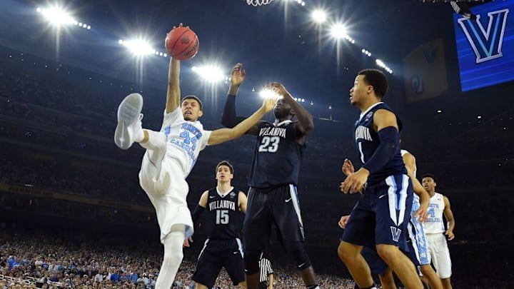 Apr 4, 2016; Houston, TX, USA; North Carolina Tar Heels forward Justin Jackson (44) battles for a rebound with Villanova Wildcats forward Daniel Ochefu (23) in the second half in the championship game of the 2016 NCAA Men