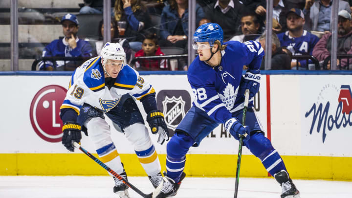 TORONTO, ON - OCTOBER 7: William Nylander #88 of the Toronto Maple Leafs skates against Jay Bouwmeester #19 of the St. Louis Blues during the second period at the Scotiabank Arena on October 7, 2019 in Toronto, Ontario, Canada. (Photo by Mark Blinch/NHLI via Getty Images)